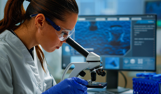 portrait-scientist-looking-microscope-medical-development-laboratory-analyzing-petri-dish-sample-medicine-biotechnology-research-advanced-pharma-lab-examining-virus-evolution_482257-12814 1